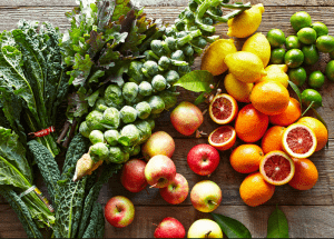 a group of fruits and vegetables on a wood surface Healthy Weight Loss Diets Feltham